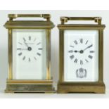 A 1970s brass 8 day carriage clock, commemorating the Queens' Silver Jubilee, together with a