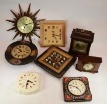A collection of mid 20th century and later wall clocks and mantel clocks, having manual and quartz