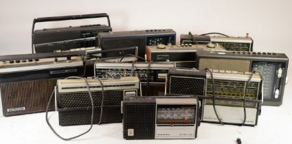 A large collection of mid 20th century and later transistor radios in four boxes. (4) All electrical