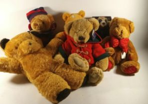 Three Harrods teddy bears, dated 1997, 2003, 2004, together with a Winnie the pooh, Meercat plush