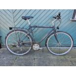 An Arette GT gentleman's 21 speed bicycle, with Acera Shimano gears and Weinmann rims