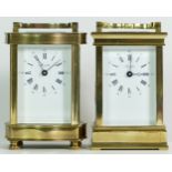 Two French brass 8 day carriage clocks, having enamelled dials with Roman numerals. (2)