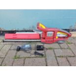 A Wolf Garten cordless Li-Ion hedge cutter, model HSA 45, with charger and two batteries