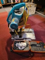 A Makita LC1230 110 volt chop saw and a Nikon AZ-1 level in case