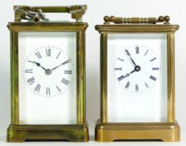 A brass 8 day carriage clock, the movement striking on bell, together with an unnamed example. (2)