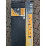 An Outdoor Accessories pruner attachment and a hedge cutter attachment, both unused