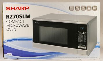 A Sharp R270 SLM compact microwave oven, in a sealed box, https://www.amazon.co.uk/Sharp-R270SLM-