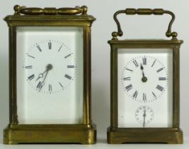 An early 20th century brass carriage alarm clock, the 8 day movement striking on bell, together with