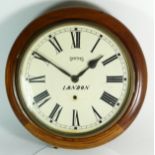 An early 20th century mahogany drop dial wall clock, the painted dial signed Smiths London,
