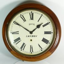 An early 20th century mahogany drop dial wall clock, the painted dial signed Smiths London,