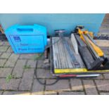 A Polar Professional pipe freezer kit, various pumping tools, an electric tile cutter and a