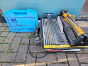 A Polar Professional pipe freezer kit, various pumping tools, an electric tile cutter and a