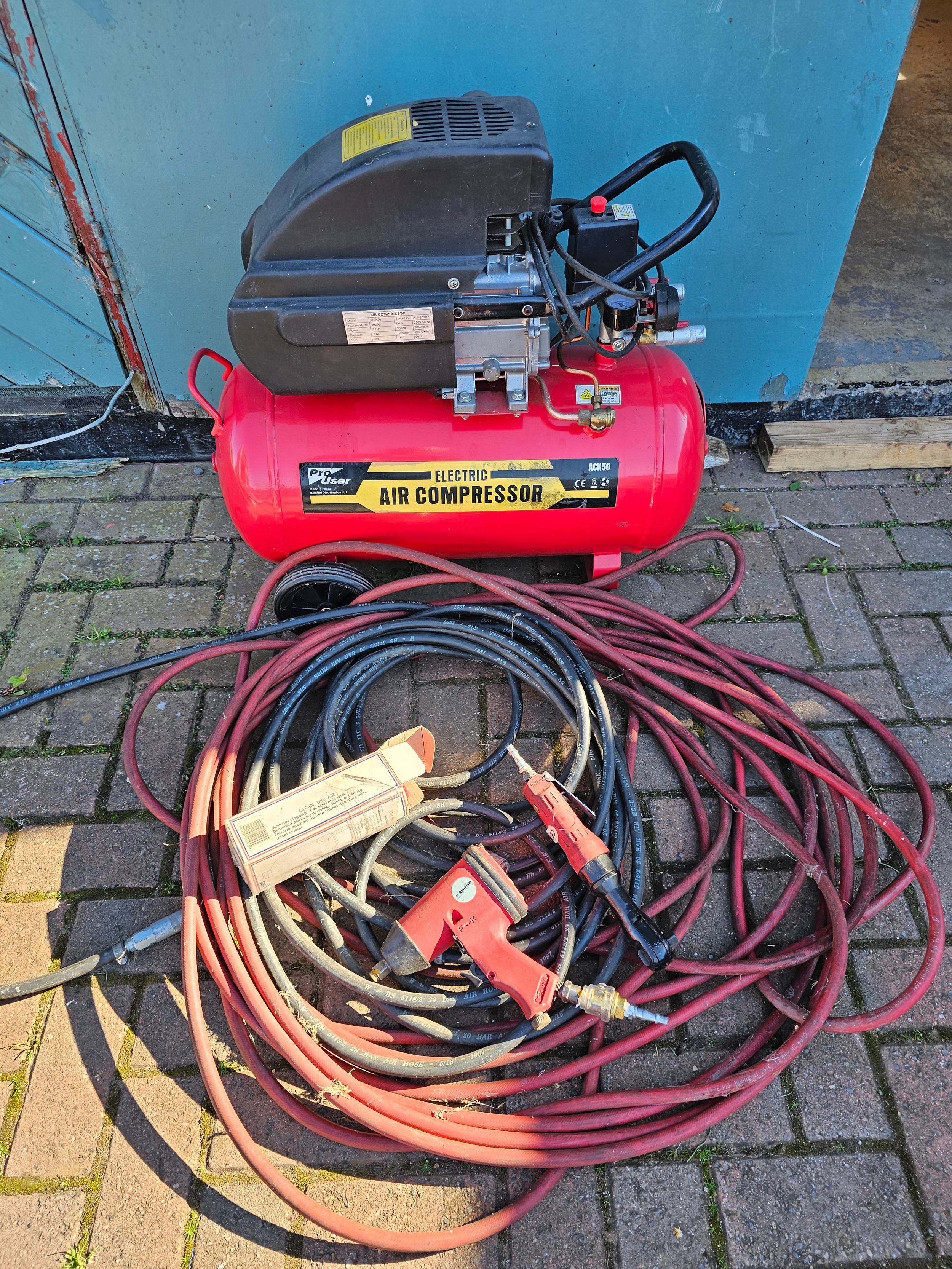 A Pro User 8 bar air compressor, model ACK50, 2hp, with air line and air tools