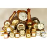 A collection of mid 20th century and later mantel clocks, anniversary clocks, wall clocks, and