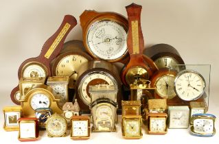 A collection of mid 20th century and later mantel clocks, anniversary clocks, wall clocks, and