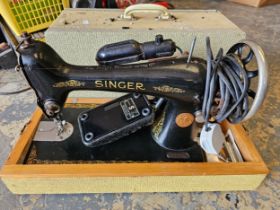 A Singer electric sewing machine, model number Y2664474, carry case