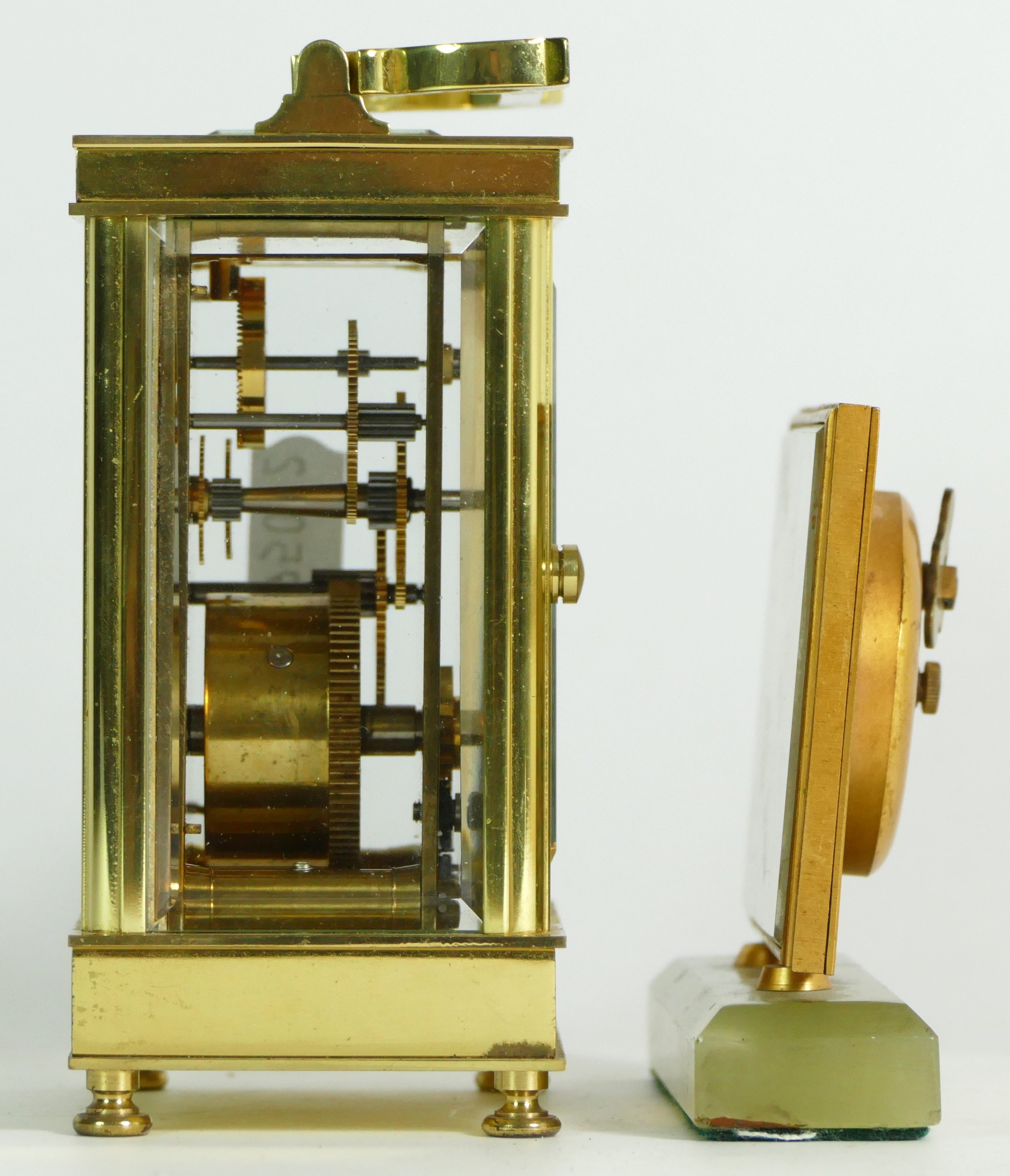 An English 8 day brass carriage clock, retailed by Asprey, together with a Swiss bedside clock on - Image 2 of 3