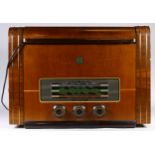 A 1950's electric Ekco radio with a fitted turntable. (model number- TRG 249)