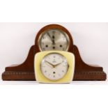 A 1950s oak cased Westminster chime mantel clock, having an eight day movement striking on four