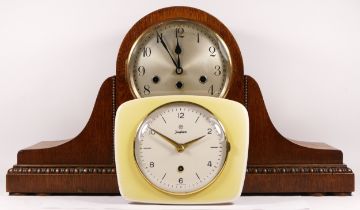 A 1950s oak cased Westminster chime mantel clock, having an eight day movement striking on four