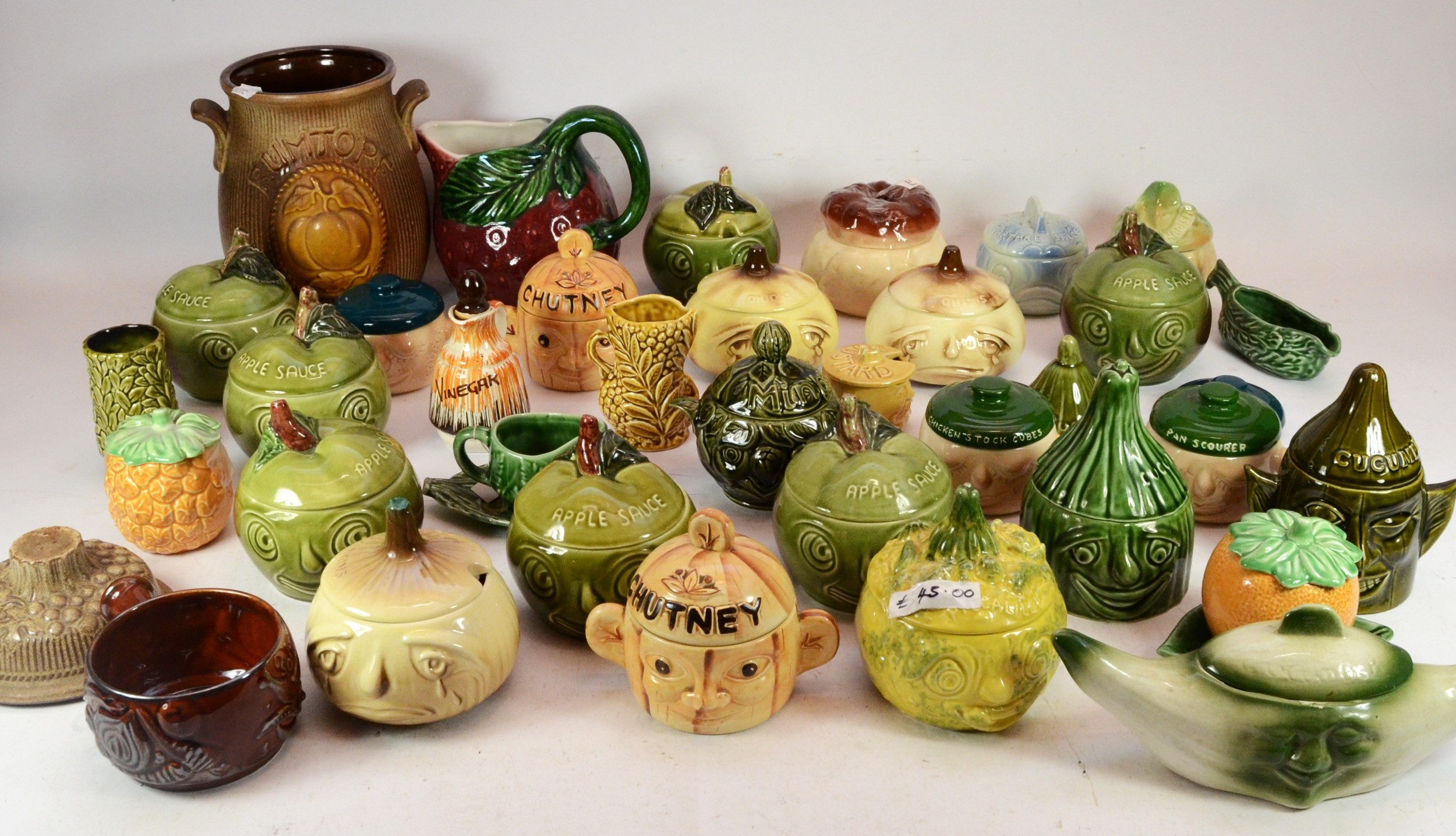 A large collection of primarily Sylvac lidded condiment pots, circa 1970s, together with Sylvac