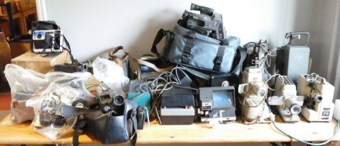 A substantial amount of type writers and cameras, to include a Canovision A2 Hi 8, a Kodak EK2 and