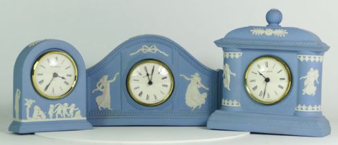 Three Wedgewood blue Jasperware mantel clocks, having quartz movements. (3)