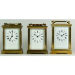 Three brass carriage clocks, having 8 day movements, 12cm tall. (3)