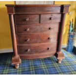 A Victorian Scottish mahogany bow front chest of drawers, the secret top drawer over