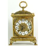 A German made brass bracket clock, having an 8 day movement striking on bell. 23cm tall.