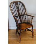 A Victorian fruitwood Windsor armchair, with pierced vase splat, the underside with Hull retailers