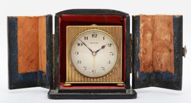 A 1920s Art Deco Zenith bedside alarm clock, having Swiss eight movement with travel case (AF) 5.5cm