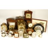 A collection of mid 20th century and later mantel clocks, anniversary clocks, wall clocks and