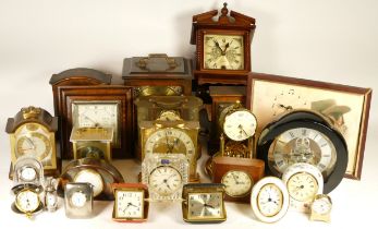 A collection of mid 20th century and later mantel clocks, anniversary clocks, wall clocks and