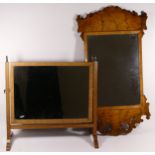 A Victorian burr walnut wall mirror, together with a mahogany swivel dressing table mirror. (2)