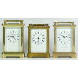 Three 1980s English brass carriage clocks, with enamelled dials and Roman numerals, housing 8 day