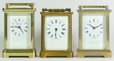 Three 1980s English brass carriage clocks, with enamelled dials and Roman numerals, housing 8 day