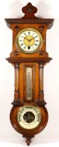 A mahogany cased combination wall clock, thermometer and barometer, circa 1890s. 64cm long.