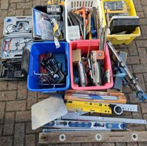 A large collection of unused and used tools