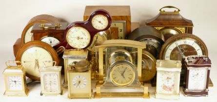 A collection of mid 20th century and later mantel clocks, anniversary clocks, wall clocks, and