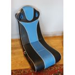 An X-Rocker folding gaming chair.