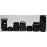 Seven camera lenses, to include a Domiplan 50mm f2.8, a Revuenon 135mm f2.8, a Hanimex 28mm f2.8,