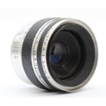 A Corfield Lumax 45mm f3.5 lens (serial number L1918122)