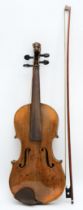 An early 20th century German violin, with two piece back, inlaid with boxwood and lion head, cased.