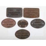 Four cast-iron carriage plates (L.M.S Wolverton 1944, B.R Earlestown 1959 and 1960), together with