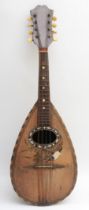 An early 20th century cased mandolin, maker F.DE. Mureda of Napoli Italy, having inlaid beading