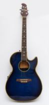 A Tanglewood Odyssey electro acoustic guitar, model no TMO-7CGS STBL, soft case.