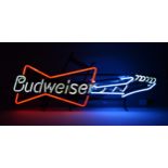 A neon sign advertising Budweiser, in the form of an electric guitar, 95 x 34 x 18cm