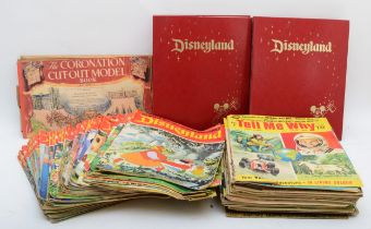 A large collection of Disneyland weekly pictorials in binders, circa 1970s, together with 'tell me