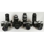 Four 35mm film cameras with lenses, to include a Minolta XG-M with a Centon 70mm-210mm f4-f5.6 lens,